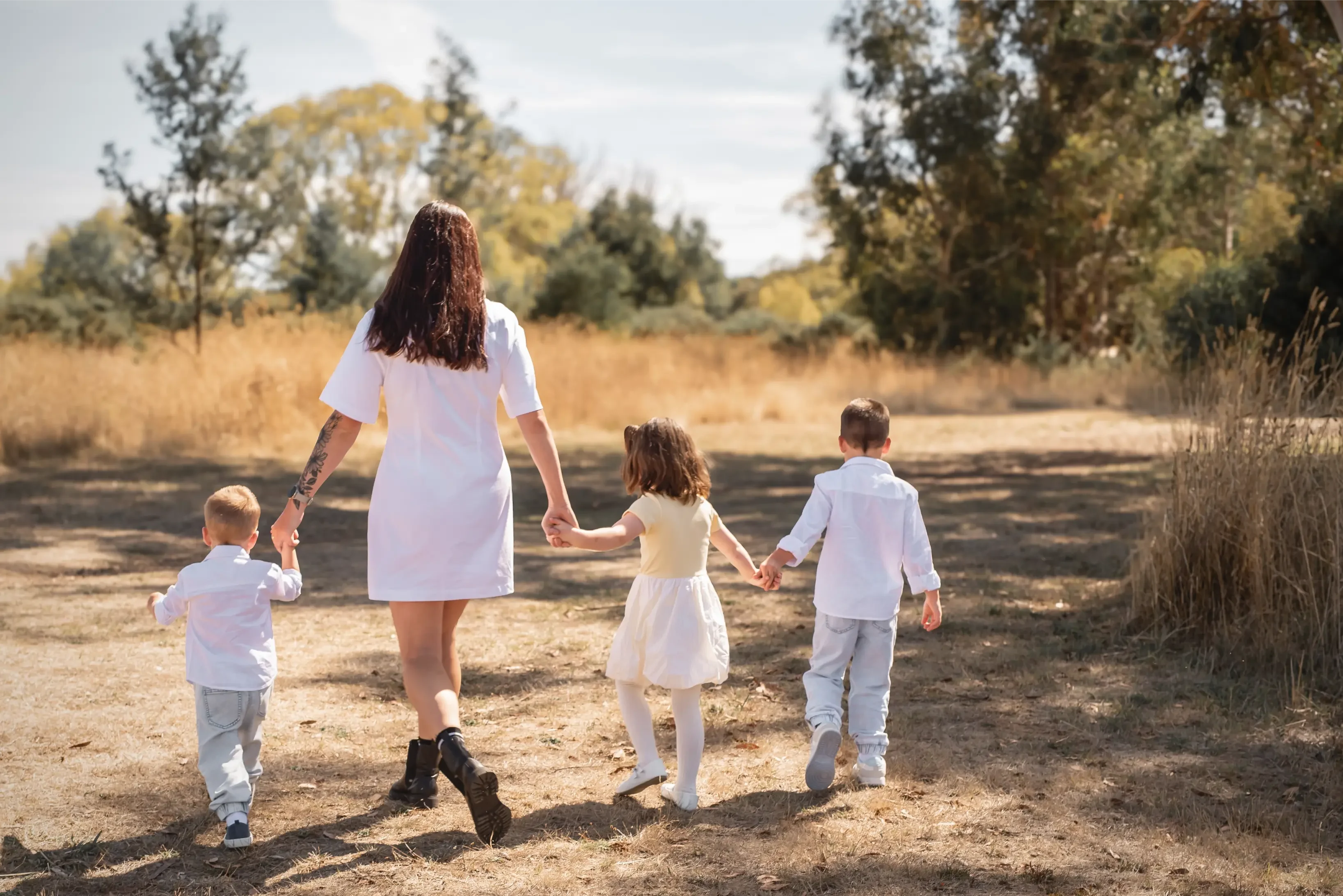 Mother Children Walking Outdoors